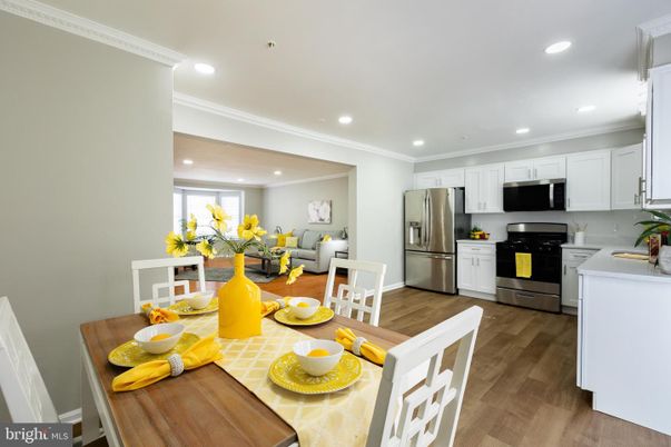 Dining room, Interior, Kitchen, Recessed Lighting, Stainless Steel Appliances, Wood Texture Flooring