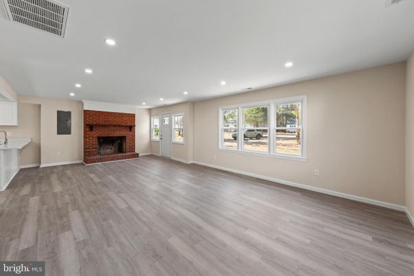 Empty room, Fireplace, Interior, Recessed Lighting, Wood Texture Flooring