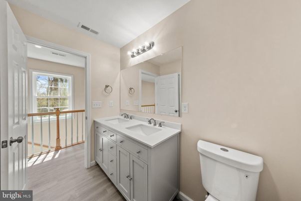 Bathroom, Dual Sink Vanities, Free Standing Baths, Interior, Wood Texture Flooring