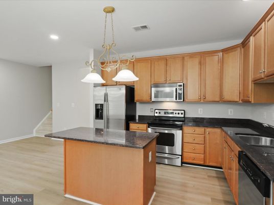 Chandelier, Interior, Kitchen, Pendant Lights, Recessed Lighting, Stainless Steel Appliances, Wood Texture Flooring