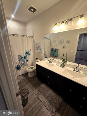 Bathroom, Dual Sink Vanities, Interior, Recessed Lighting, Wood Texture Flooring