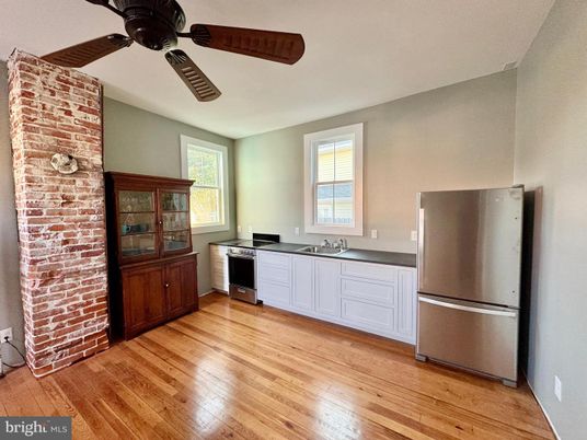 Interior, Kitchen, Stainless Steel Appliances, Stone Walls, Wood Texture Flooring