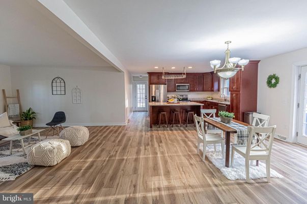 Chandelier, Dining room, Interior, Kitchen, Recessed Lighting, Stainless Steel Appliances, Wood Texture Flooring