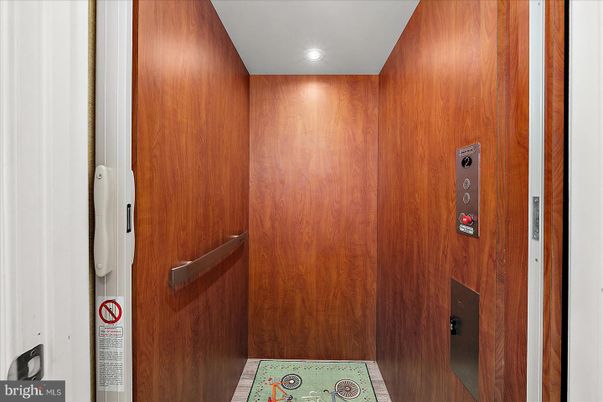 Elevator, Interior, Recessed Lighting, Wooden Walls