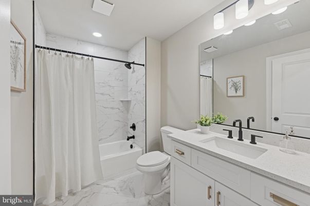 Bathroom, Dual Sink Vanities, Interior, Marble, Marble Walls, Recessed Lighting