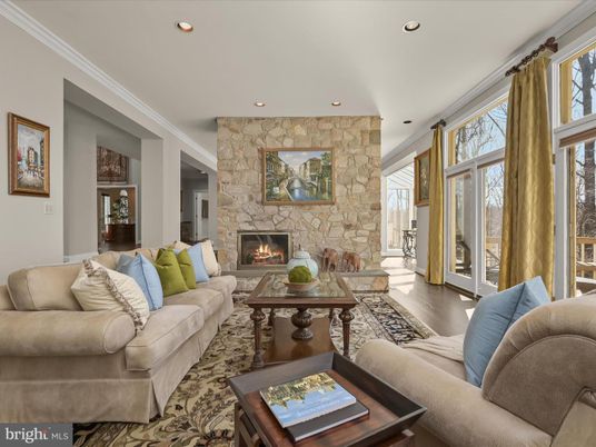 Fireplace, Interior, Living room, Recessed Lighting, Stone Walls, Wood Texture Flooring