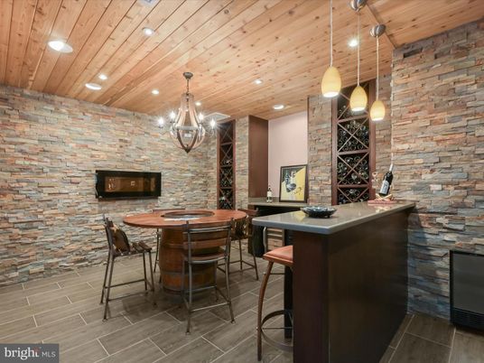 Chandelier, Dining room, Interior, Pendant Lights, Recessed Lighting, Stone Walls, Wine Storage, Wooden Ceilings
