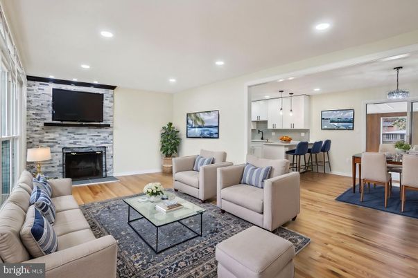 Dining room, Fireplace, Interior, Living room, Pendant Lights, Recessed Lighting, Wood Texture Flooring