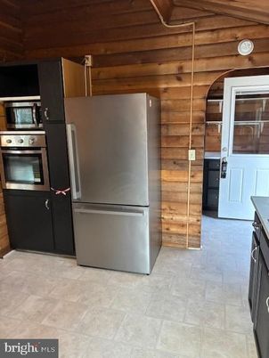 Interior, Kitchen, Stainless Steel Appliances, Wooden Walls