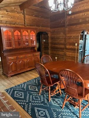 Chandelier, Dining room, Interior, Wood Texture Flooring, Wooden Walls