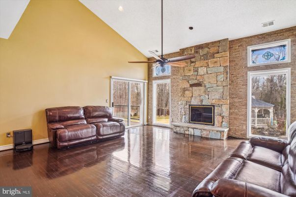 Fireplace, Interior, Recessed Lighting, Stone Walls, Wood Texture Flooring