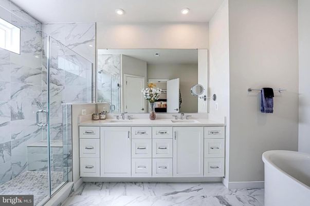 Bathroom, Dual Sink Vanities, Glass Shower, Interior, Marble, Marble Walls, Recessed Lighting