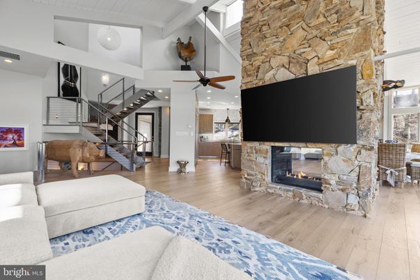 Fireplace, Interior, Kitchen, Living room, Recessed Lighting, Stone Walls, Wood Texture Flooring