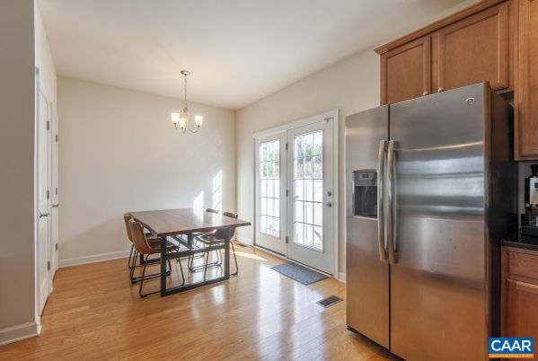 Chandelier, Dining room, Interior, Kitchen, Stainless Steel Appliances, Wood Texture Flooring