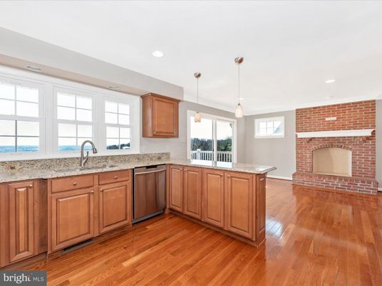 Fireplace, Interior, Kitchen, Pendant Lights, Recessed Lighting, Stone Walls, Wood Texture Flooring