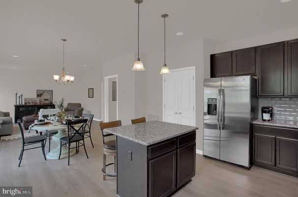 Chandelier, Dining room, Interior, Kitchen, Pendant Lights, Recessed Lighting, Stainless Steel Appliances, Wood Texture Flooring