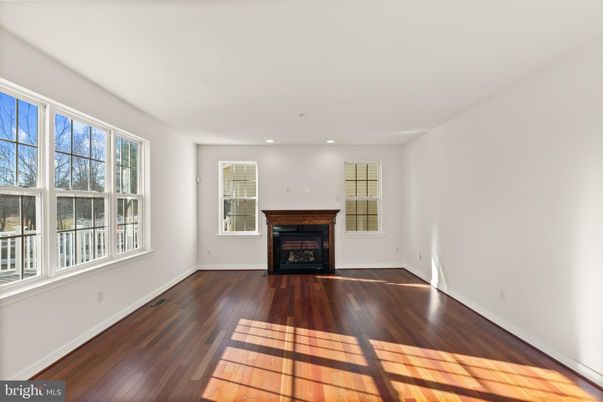 Empty room, Fireplace, Interior, Recessed Lighting, Wood Texture Flooring