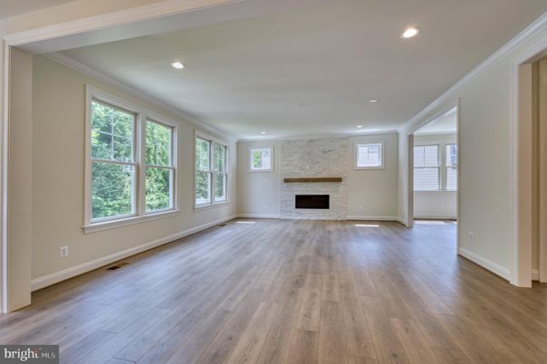 Empty room, Fireplace, Interior, Recessed Lighting, Stone Walls, Wood Texture Flooring