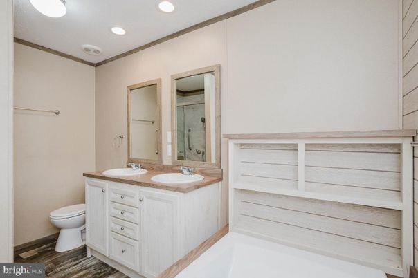Bathroom, Dual Sink Vanities, Interior, Recessed Lighting, Wood Texture Flooring