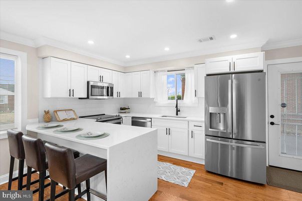 Interior, Kitchen, Recessed Lighting, Stainless Steel Appliances, Wood Texture Flooring