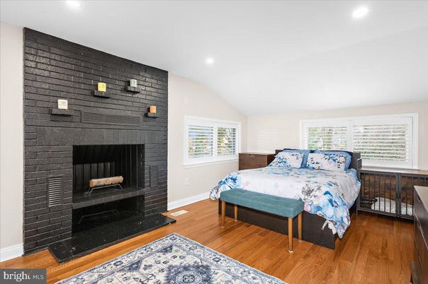 Bedroom, Fireplace, Interior, Recessed Lighting, Wood Texture Flooring