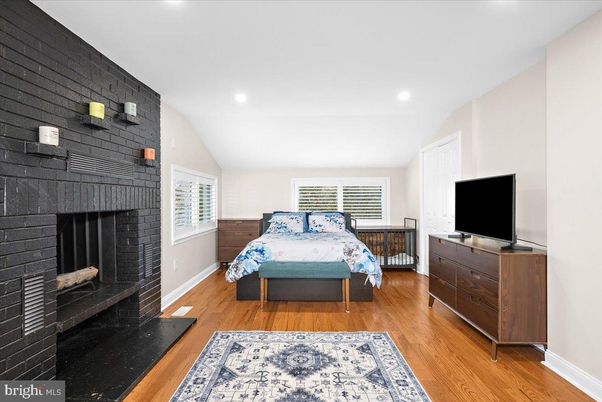 Bedroom, Fireplace, Interior, Recessed Lighting, Wood Texture Flooring