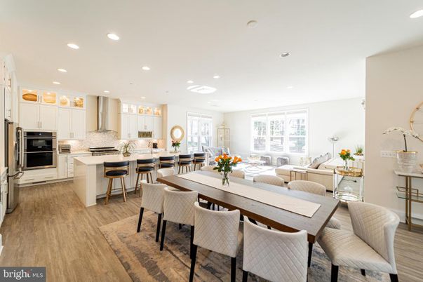 Dining room, Interior, Kitchen, Living room, Recessed Lighting, Stainless Steel Appliances, Wood Texture Flooring