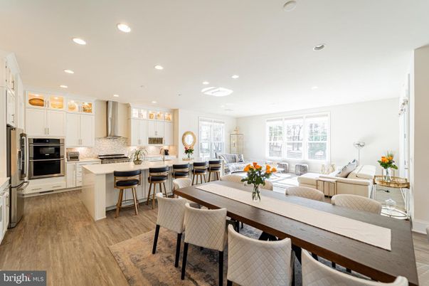 Dining room, Interior, Kitchen, Living room, Recessed Lighting, Stainless Steel Appliances, Wood Texture Flooring