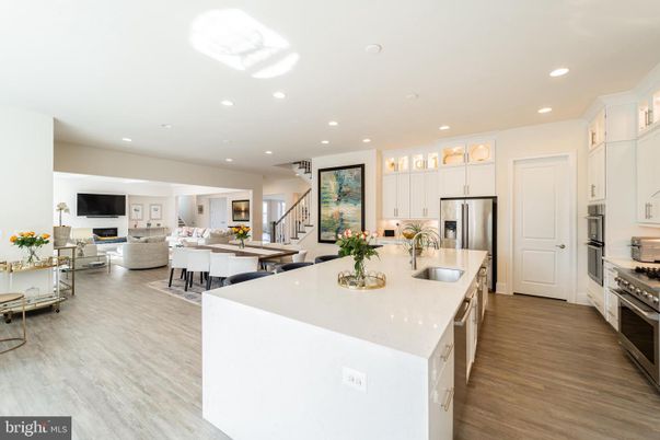 Dining room, Interior, Kitchen, Living room, Recessed Lighting, Stainless Steel Appliances, Wood Texture Flooring