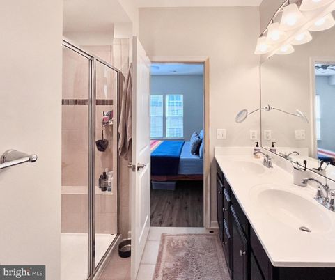Bathroom, Dual Sink Vanities, Glass Shower, Interior, Wood Texture Flooring