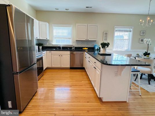 Dining room, Interior, Kitchen, Pendant Lights, Recessed Lighting, Stainless Steel Appliances, Wood Texture Flooring