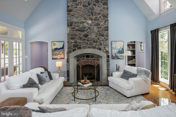 Fireplace, Interior, Living room, Recessed Lighting, Stone Walls, Wood Texture Flooring