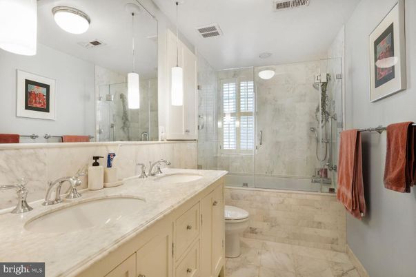 Bathroom, Dual Sink Vanities, Glass Shower, Interior, Marble, Marble Walls