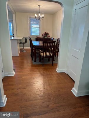 Chandelier, Dining room, Interior, Wood Texture Flooring