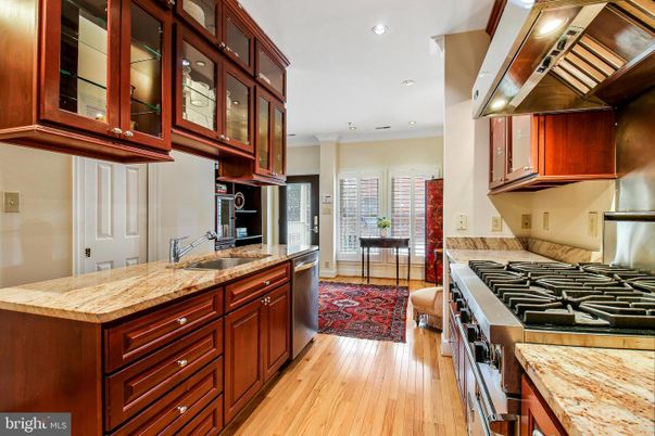 Dining room, Interior, Kitchen, Recessed Lighting, Stainless Steel Appliances, Wood Texture Flooring