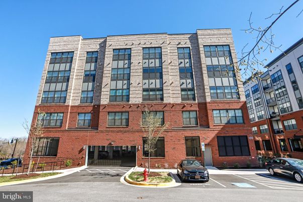 Exterior, Facade, Brick Facade, Condo Building