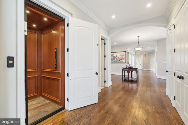 Elevator, Interior, Pendant Lights, Recessed Lighting, Wooden Ceilings, Wood Texture Flooring, Wooden Walls