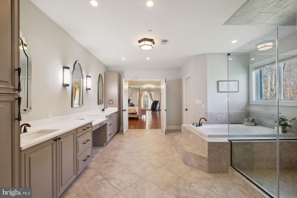 Bathroom, Dual Sink Vanities, Glass Shower, Interior, Recessed Lighting, Wood Texture Flooring