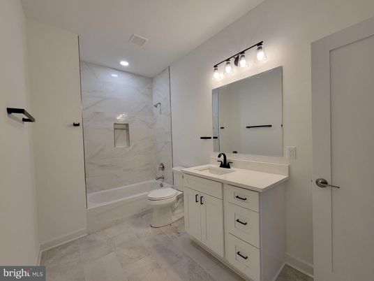 Bathroom, Dual Sink Vanities, Interior, Marble Walls, Recessed Lighting
