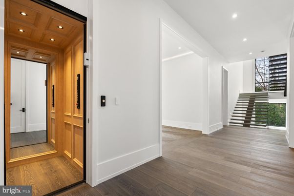 Elevator, Interior, Recessed Lighting, Wooden Ceilings, Wood Texture Flooring, Wooden Walls