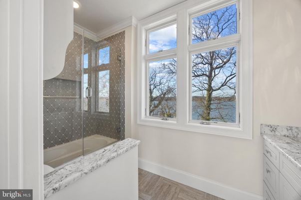 Bathroom, Glass Shower, Interior, Recessed Lighting, Wood Texture Flooring