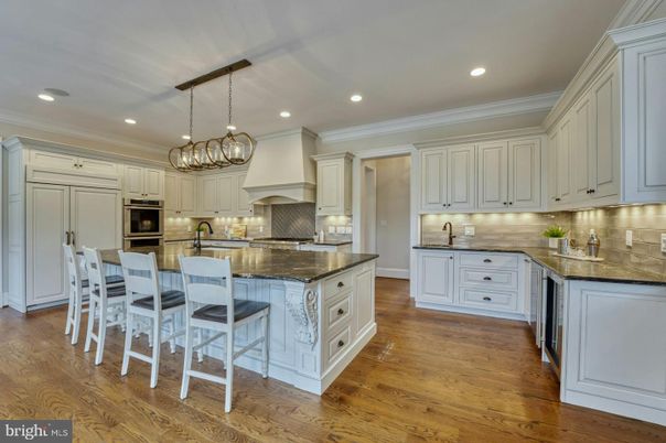 Chandelier, Interior, Kitchen, Pendant Lights, Recessed Lighting, Stainless Steel Appliances, Wood Texture Flooring