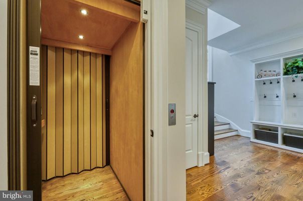 Elevator, Interior, Recessed Lighting, Wood Texture Flooring, Wooden Walls