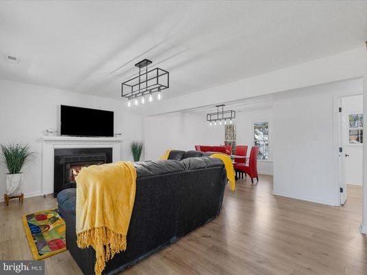 Dining room, Fireplace, Interior, Living room, Pendant Lights, Wood Texture Flooring