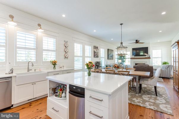 Dining room, Fireplace, Interior, Kitchen, Living room, Pendant Lights, Recessed Lighting, Stainless Steel Appliances, Wood Texture Flooring