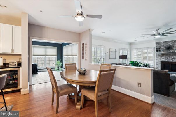 Dining room, Fireplace, Interior, Recessed Lighting, Stone Walls, Wood Texture Flooring