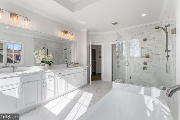 Bathroom, Dual Sink Vanities, Glass Shower, Interior, Marble, Marble Walls, Recessed Lighting
