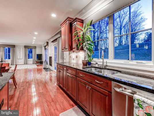 Fireplace, Interior, Kitchen, Recessed Lighting, Stainless Steel Appliances, Wood Texture Flooring