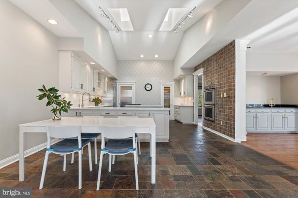 Interior, Kitchen, Recessed Lighting, Stainless Steel Appliances, Stone Walls, Wood Texture Flooring