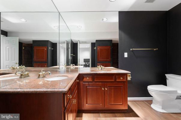 Bathroom, Dual Sink Vanities, Interior, Recessed Lighting, Wood Texture Flooring